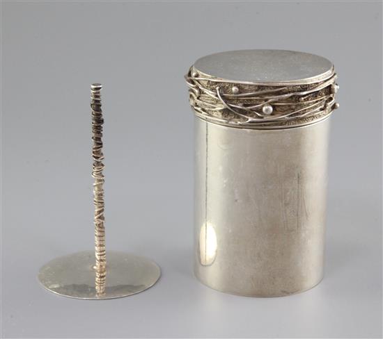 A 1970s silver cylindrical cigarette canister and cover by Graham Watling of Lacock, gross 14 oz.